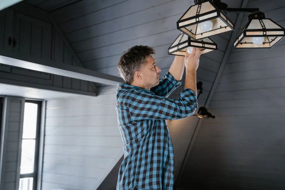 Technician inspecting a Waco attic for rodent activity