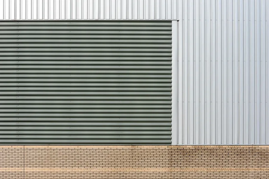 Monitoring station placed along a warehouse wall