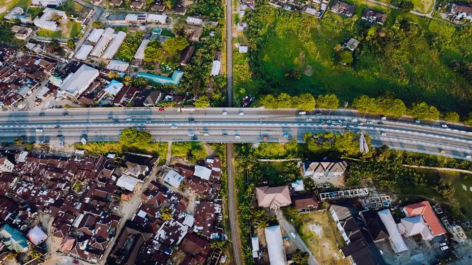Aerial view of homes near a highway
