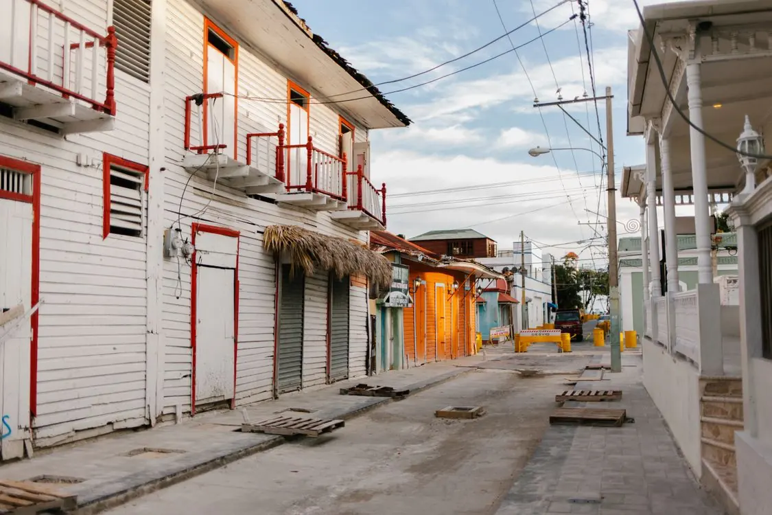 Small-town street with homes and trees