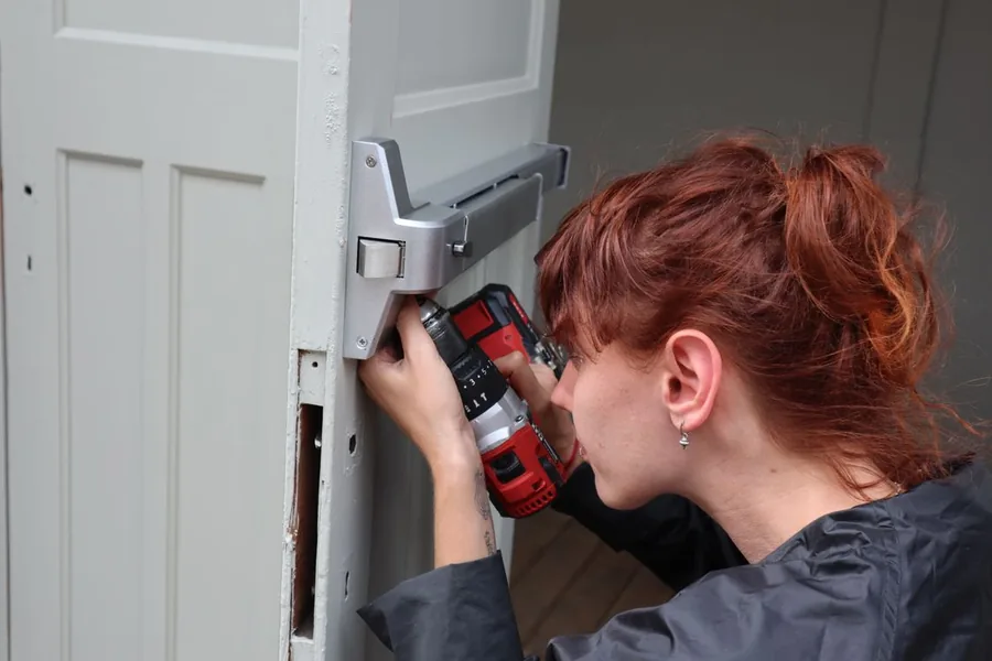 Fitting a door sweep to close the gap under a door